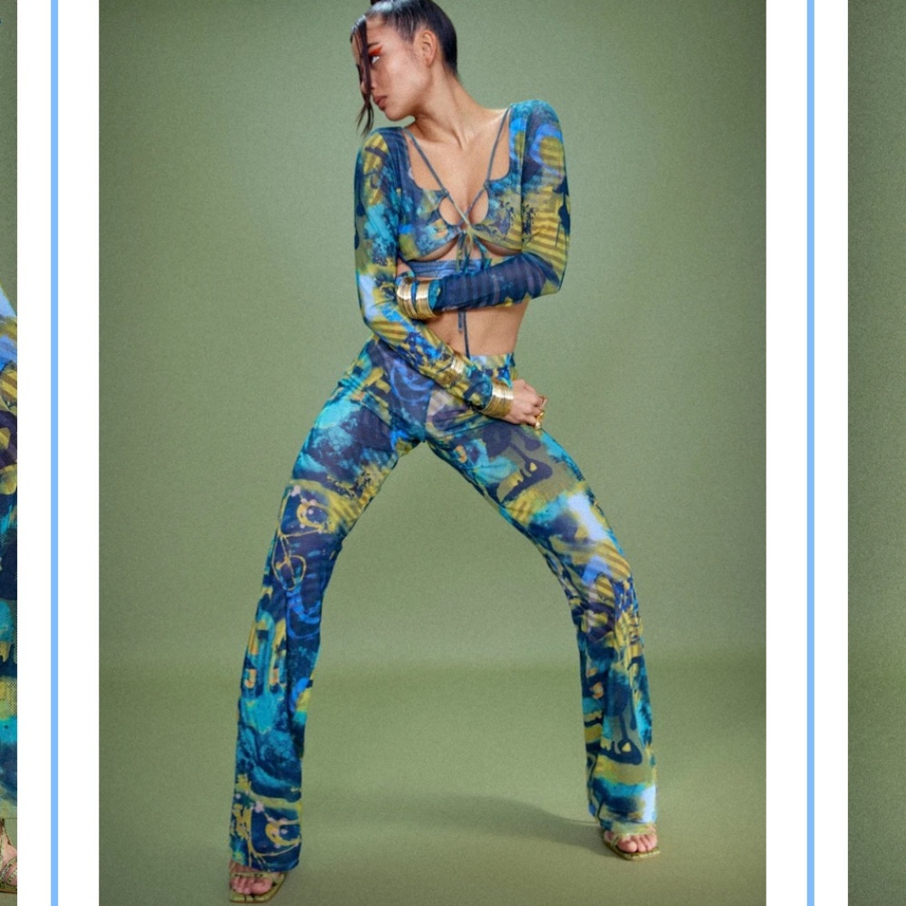 ABSTRACT BURN PRINT MESH BOOTCUT TROUSERS